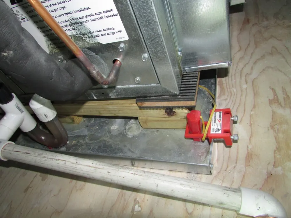 Attic air handler condensate drain service in a Lafayette, LA home