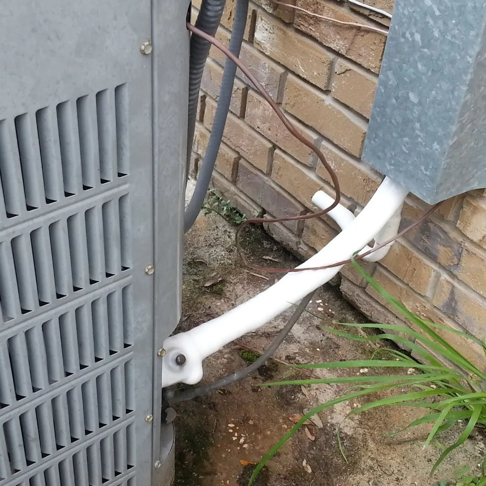 Ice forming on air conditioning lines during a Lafayette, LA summer